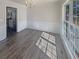 Dining room featuring laminate flooring and natural light at 1997 Alcovy Trace Way, Lawrenceville, GA 30045