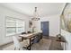 Modern dining room with stylish chandelier, table with seating for six, and elegant decor at 2206 Loring Ct, Decatur, GA 30032