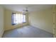 Bedroom featuring natural light from window with wall to wall carpet at 2910 Mitchell Ne Cv, Brookhaven, GA 30319