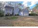 Beautiful two-story blue home with a two-car garage and lovely front yard landscaping at 2910 Mitchell Ne Cv, Brookhaven, GA 30319