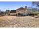 Spacious backyard with a screened in porch and mature trees at 685 Trailwood Sw Ln, Marietta, GA 30064