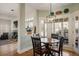 Open-concept dining area with views of the living room and outdoor patio at 685 Trailwood Sw Ln, Marietta, GA 30064