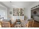 Comfortable living room with built-in bookcase, stylish decor, and seamless transition to adjacent spaces at 685 Trailwood Sw Ln, Marietta, GA 30064