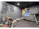 Home gym features exercise equipment and motivational decor; a great space for staying active and healthy at 1353 Wilson Manor Cir, Lawrenceville, GA 30045