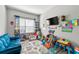 Playroom filled with toys and colorful decorations provides a fun space for children at 1353 Wilson Manor Cir, Lawrenceville, GA 30045