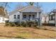 Charming bungalow with a welcoming front porch and well-maintained landscaping at 495 Woodlawn Ave, Atlanta, GA 30318