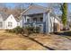 Charming home with a welcoming front porch, showcasing classic architectural details and curb appeal at 495 Woodlawn Ave, Atlanta, GA 30318