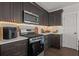 Well-equipped kitchen featuring modern appliances and stylish cabinetry at 495 Woodlawn Ave, Atlanta, GA 30318