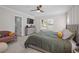 Tranquil primary bedroom featuring plush carpeting, a large bed, and lots of natural light at 495 Woodlawn Ave, Atlanta, GA 30318