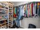 Organized walk-in closet with shelving and hanging racks for maximum storage capacity, ideal for a well-ordered wardrobe at 495 Woodlawn Ave, Atlanta, GA 30318