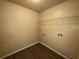 Laundry room featuring utility hookups and painted walls at 5488 Wexford Pass, Atlanta, GA 30349