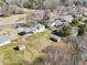 Aerial view showcasing the property's spacious lot and its proximity to nearby streets at 80 Brownsville Ext., Powder Springs, GA 30127