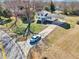 An aerial view showing the home and its driveway with a car parked outside at 80 Brownsville Ext., Powder Springs, GA 30127