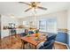 Cozy eat-in kitchen features a wood table, blue chairs and a stainless steel oven at 80 Brownsville Ext., Powder Springs, GA 30127