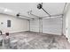 Spacious three car garage with two garage doors and plenty of room for storage at 1360 Flora Dr, Conyers, GA 30094