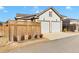 Spacious two-car garage with a driveway and a wooden fence at 1360 Flora Dr, Conyers, GA 30094