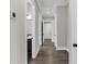 Hallway showing hardwood floors and gray paint at 1360 Flora Dr, Conyers, GA 30094