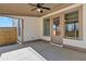 Cozy outdoor patio area with a ceiling fan, perfect for relaxation at 1360 Flora Dr, Conyers, GA 30094
