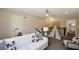 Cozy loft area with a white sofa, modern decor, and plenty of natural light at 2446 Naples St, Hoschton, GA 30548