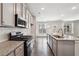 This is a great kitchen featuring stainless appliances, granite countertops and hardwood floors at 247 Oaklawn Park, Dacula, GA 30019