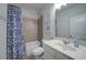 Bathroom featuring a vanity, a framed mirror, and a shower with a decorative shower curtain at 5160 Meridian Pass, Cumming, GA 30028