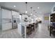 Spacious kitchen with granite countertops, stainless steel appliances, and a large island at 5160 Meridian Pass, Cumming, GA 30028