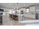 Modern kitchen with granite countertops, stainless steel appliances, and an oversized island at 5160 Meridian Pass, Cumming, GA 30028