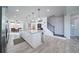 Spacious kitchen with island and granite counters, featuring modern appliances and ample lighting at 5160 Meridian Pass, Cumming, GA 30028