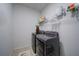 Well-equipped laundry room with modern washer and dryer units, offering convenience and functionality at 5160 Meridian Pass, Cumming, GA 30028