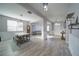 Open floor plan featuring a dining area and a living room at 5160 Meridian Pass, Cumming, GA 30028
