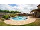 Inviting backyard pool and patio area, perfect for relaxing or entertaining at 5160 Meridian Pass, Cumming, GA 30028
