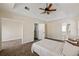 Large bedroom with a queen bed, a ceiling fan, and an ensuite bathroom at 2715 Kaley Nw Ln, Kennesaw, GA 30152