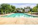 A long swimming pool surrounded by lounge chairs at 2715 Kaley Nw Ln, Kennesaw, GA 30152