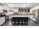 Well-equipped kitchen with stainless steel appliances, island with seating, and ample counter space at 2715 Kaley Nw Ln, Kennesaw, GA 30152
