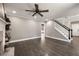 Spacious living room featuring a fireplace, modern decor, and hardwood floors at 2715 Kaley Nw Ln, Kennesaw, GA 30152