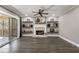 Bright living room features modern fixtures, a fireplace, and access to the screened-in porch at 2715 Kaley Nw Ln, Kennesaw, GA 30152