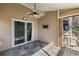 Indoor patio with tile flooring leading out to the fenced in backyard at 2715 Kaley Nw Ln, Kennesaw, GA 30152