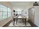 Elegantly staged dining room showcasing hardwood floors and an inviting space for formal gatherings at 5500 Marbut Forest Way, Lithonia, GA 30058
