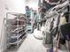 Walk-in closet featuring an abundance of storage space and shelving for shoes, clothes, and accessories at 677 Brennan Dr, Decatur, GA 30033