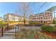 View of a communal area with benches and green spaces, perfect for relaxing and enjoying the outdoors at 677 Brennan Dr, Decatur, GA 30033