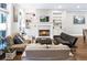 Cozy living room featuring a fireplace, built-in shelving, and comfortable seating at 677 Brennan Dr, Decatur, GA 30033