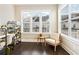 Comfortable home office with natural light and hardwood floors at 677 Brennan Dr, Decatur, GA 30033