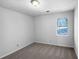 Serene bedroom featuring soft carpet and a window with natural light at 1090 Ohara Dr, Jonesboro, GA 30236