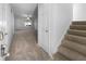 Entryway with staircase, neutral carpet, and view to living space at 1090 Ohara Dr, Jonesboro, GA 30236