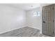 Finished basement room with hardwood floors, window and closet at 161 Kingswood Dr, Ellenwood, GA 30294