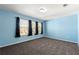 Light and airy bedroom featuring a large window and neutral color scheme at 3744 Misty Wood Nw Dr, Marietta, GA 30064