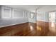 Spacious living room with hardwood floors, decorative molding, and modern lighting fixtures at 3744 Misty Wood Nw Dr, Marietta, GA 30064