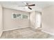 Comfortable bedroom is carpeted and features a ceiling fan and natural light at 1145 Canal St, Decatur, GA 30032