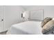 Minimalist bedroom with neutral tones, plush pillows, and clean, simple decor at 2383 Colonial Ne Dr, Brookhaven, GA 30319