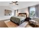 Bright bedroom featuring neutral decor, ample natural light and hardwood floors at 2383 Colonial Ne Dr, Brookhaven, GA 30319